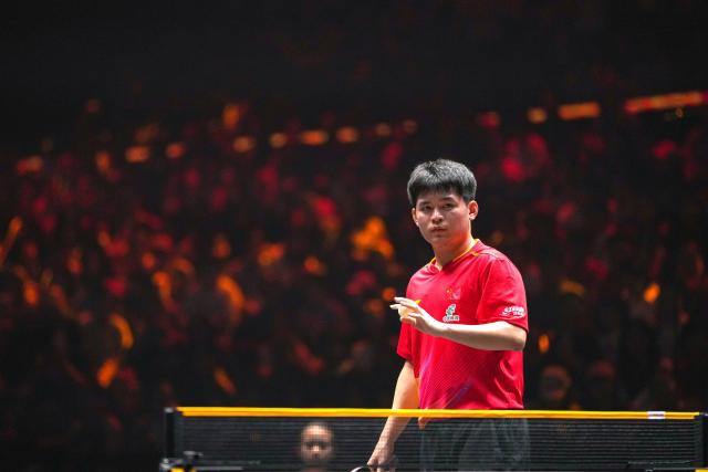 (251003) -- BEIJING, Oct. 3, 2025 (Xinhua) -- Lin Shidong reacts during the men's singles quarterfinal match between Lin Shidong of China and Uda Yukiya of Japan at 2025 World Table Tennis (WTT) China Smash in Beijing, China, Oct. 3, 2025. (Xinhua/Ju Huanzong)