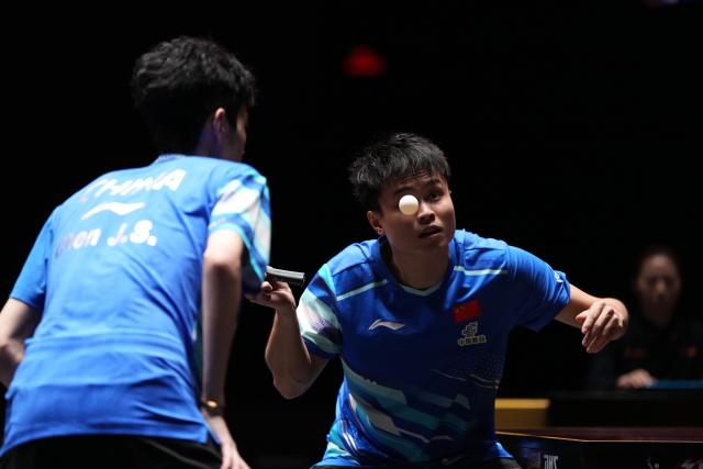 (251003) -- BEIJING, Oct. 3, 2025 (Xinhua) -- Zhou Qihao (R)/Chen Junsong compete during the men's doubles semifinal match between Zhou Qihao/Chen Junsong of China and Matsushima Sora/Togami Shunsuke of Japan at 2025 World Table Tennis (WTT) China Smash in Beijing, China, Oct. 3, 2025. (Xinhua/Ju Huanzong)