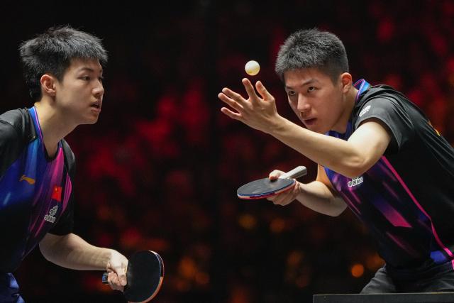 (251003) -- BEIJING, Oct. 3, 2025 (Xinhua) -- Huang Youzheng/Wen Ruibo (R) compete during the men's doubles semifinal match between Huang Youzheng/Wen Ruibo of China and Wang Chuqin/Lin Shidong of China at 2025 World Table Tennis (WTT) China Smash in Beijing, China, Oct. 3, 2025. (Xinhua/Ju Huanzong)