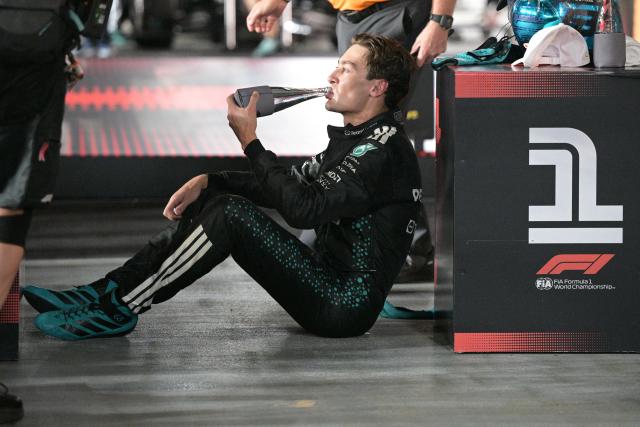 (251006) -- SINGAPORE, Oct. 6, 2025 (Xinhua) -- Mercedes' British driver George Russell celebrates after the Formula 1 Singapore Grand Prix 2025 in Singapore, Oct. 5, 2025. (Photo by Then Chih Wey/Xinhua)
