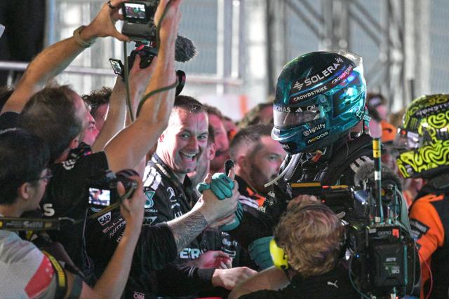 (251006) -- SINGAPORE, Oct. 6, 2025 (Xinhua) -- Mercedes' British driver George Russell celebrates after the Formula 1 Singapore Grand Prix 2025 in Singapore, Oct. 5, 2025. (Photo by Then Chih Wey/Xinhua)
