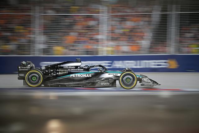(251006) -- SINGAPORE, Oct. 6, 2025 (Xinhua) -- Mercedes' British driver George Russell drives during the Formula 1 Singapore Grand Prix 2025 in Singapore, Oct. 5, 2025. (Photo by Then Chih Wey/Xinhua)