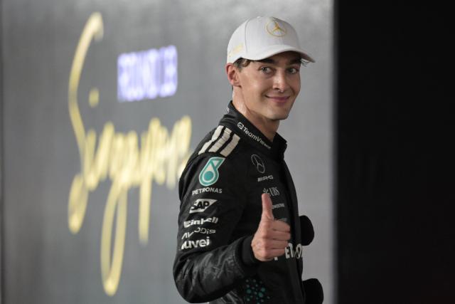 (251006) -- SINGAPORE, Oct. 6, 2025 (Xinhua) -- Mercedes' British driver George Russell celebrates after the Formula 1 Singapore Grand Prix 2025 in Singapore, Oct. 5, 2025. (Photo by Then Chih Wey/Xinhua)