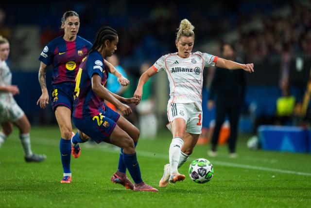 (251008) -- BARCELONA, Oct. 8, 2025 (Xinhua) -- Esmee Brugts (front L) of Barcelona defends Linda Dallmann (front R) of Bayern Munich during the league phase match between FC Barcelona and Bayern Munich at the UEFA Women's Champions League in Barcelona, Spain, Oct. 7, 2025. (Photo by Joan Gosa/Xinhua)