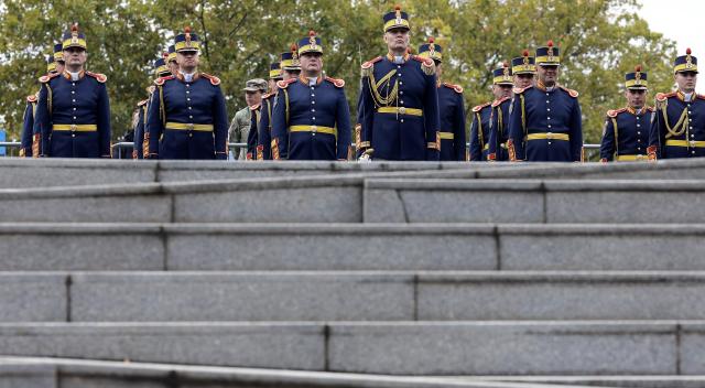 (251010) -- BUCHAREST, Oct. 10, 2025 (Xinhua) -- Soldiers attend a ceremony to mark the Romanian national Holocaust remembrance day in Bucharest, Romania, Oct. 9, 2025. (Photo by Cristian Cristel/Xinhua)