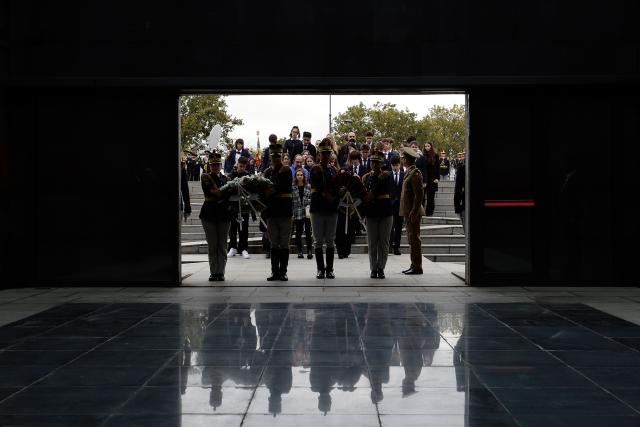 (251010) -- BUCHAREST, Oct. 10, 2025 (Xinhua) -- Members of the Romanian Jewish community and an honor guard attend a wreath laying ceremony to mark the Romanian national Holocaust remembrance day in Bucharest, Romania, Oct. 9, 2025. (Photo by Cristian Cristel/Xinhua)