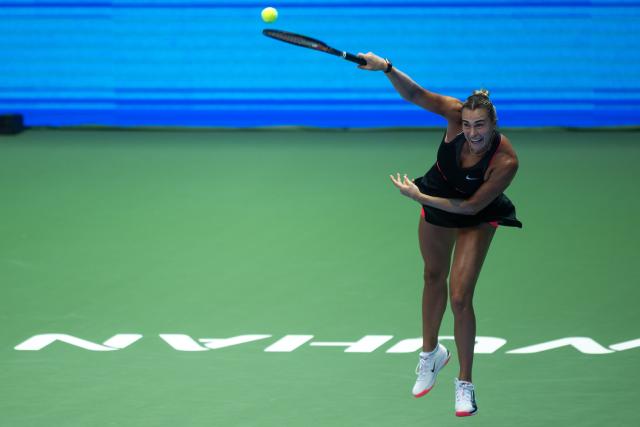 (251010) -- WUHAN, Oct. 10, 2025 (Xinhua) -- Aryna Sabalenka serves during the women's singles quarterfinal match between Elena Rybakina of Kazakhstan and Aryna Sabalenka of Belarus at the 2025 Wuhan Open tennis tournament in Wuhan, central China's Hubei Province, Oct. 10, 2025. (Xinhua/Xiao Yijiu)