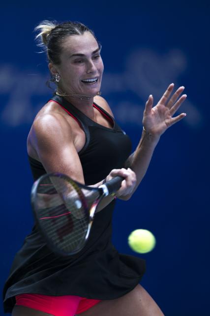 (251010) -- WUHAN, Oct. 10, 2025 (Xinhua) -- Aryna Sabalenka hits a return during the women's singles quarterfinal match between Elena Rybakina of Kazakhstan and Aryna Sabalenka of Belarus at the 2025 Wuhan Open tennis tournament in Wuhan, central China's Hubei Province, Oct. 10, 2025. (Xinhua/Wu Zhizun)