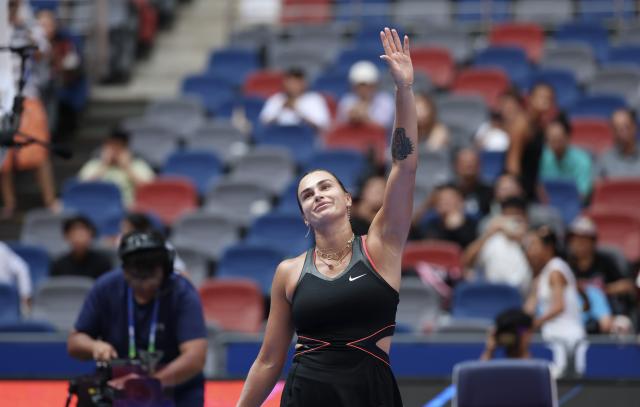 (251010) -- WUHAN, Oct. 10, 2025 (Xinhua) -- Aryna Sabalenka celebrates after the women's singles quarterfinal match between Elena Rybakina of Kazakhstan and Aryna Sabalenka of Belarus at the 2025 Wuhan Open tennis tournament in Wuhan, central China's Hubei Province, Oct. 10, 2025. (Xinhua/Bai Xuefei)