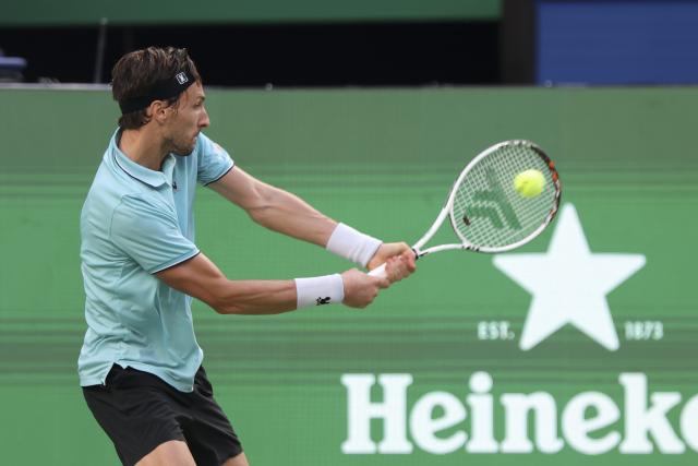 (251010) -- SHANGHAI, Oct. 10, 2025 (Xinhua) -- Arthur Rinderknech of France hits a return to Felix Auger-Aliassime of Canada during the men's singles quarterfinal at the ATP World Tour Shanghai Masters tennis tournament in Shanghai, east China, Oct. 10, 2025. (Xinhua/Wang Xiang)
