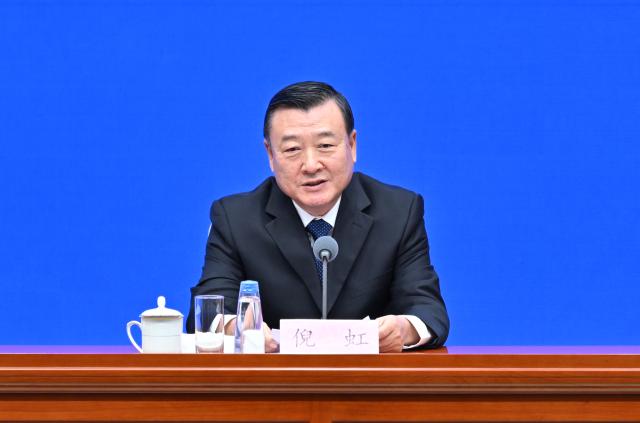(251011) -- BEIJING, Oct. 11, 2025 (Xinhua) -- China's Minister of Housing and Urban-Rural Development Ni Hong attends a press conference held by the State Council Information Office (SCIO) on achievements in high-quality housing and urban-rural development during the 14th Five-Year Plan period (2021-2025) in Beijing, capital of China, Oct. 11, 2025. (Xinhua/Li Xin)