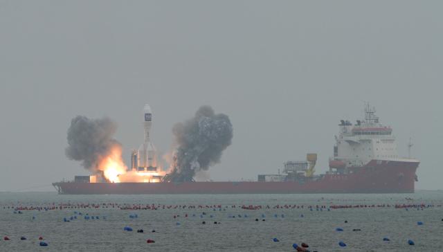 (251011) -- HAIYANG, Oct. 11, 2025 (Xinhua) -- A Gravity-1 carrier rocket carrying a wide-field satellite and two experimental satellites blasts off from waters off the coast of Haiyang, east China's Shandong Province, Oct. 11, 2025. The rocket blasted off at 10:20 a.m. (Beijing Time), placing three satellites into their designated orbits. The Taiyuan Satellite Launch Center conducted the offshore mission.
   The Gravity-1 carrier rocket made its debut flight in January 2024. (Photo by Guo Jinqi/Xinhua)