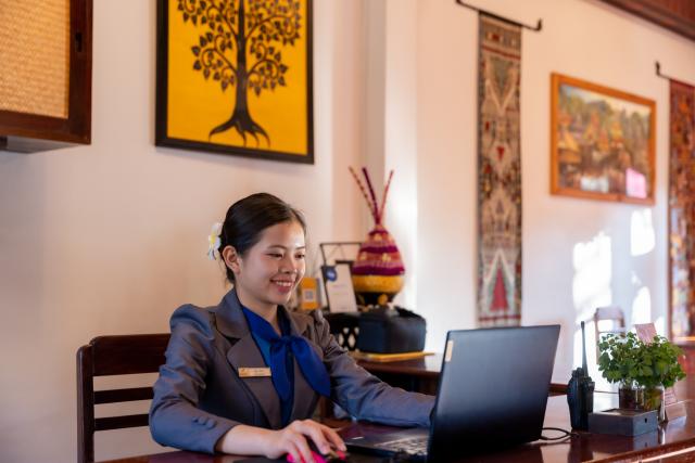 (251012) --LUANG PRABANG, Oct. 12, 2025 (Xinhua) -- A woman works at a hotel in Luang Prabang, Laos, Oct. 10, 2025. According to the World Bank statistics, the female population in Laos accounted for 49.8 percent of the country's total population in 2024. (Photo by Kaikeo Saiyasane/Xinhua)