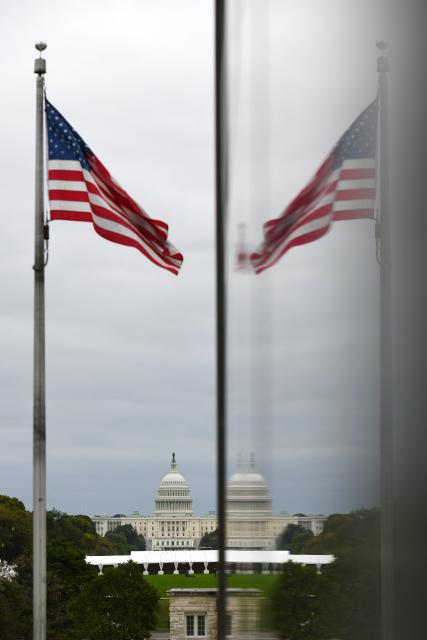 (251013) -- WASHINGTON, Oct. 13, 2025 (Xinhua) -- This photo taken on Oct. 12, 2025 shows the U.S. Capitol building in Washington, D.C., the United States. The federal government shutdown entered its 12th day. (Xinhua/Li Rui)