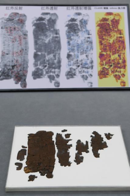 (251013) -- CHANGSHA, Oct. 13, 2025 (Xinhua) -- This photo taken on Oct. 13, 2025 shows part of the Zidanku Silk Manuscripts on display at the Hunan Museum in Changsha, capital of central China's Hunan Province.
  Two volumes of Chinese silk manuscripts dating back about 2,300 years have been returned to central China, 79 years after they were smuggled out of the country, through cooperation between Chinese and the U.S. cultural institutions.
  The second and third volumes of the Zidanku Silk Manuscripts -- precious cultural artifacts dating back to the Warring States Period (475-221 B.C.) -- were on Monday officially repatriated to Hunan Province. They will be permanently archived in the Hunan Museum in Changsha, the provincial capital.
  The manuscripts, which were unearthed from a Chu-state tomb by tomb raiders at the Zidanku site in Changsha in 1942, consist of three volumes: "Sishi Ling," "Wuxing Ling" and "Gongshou Zhan." They are a systematic record of astronomy, calendars, cosmology and military divination from China's pre-Qin period. The silk manuscripts are the earliest examples of silk text discovered to date and the oldest classical Chinese book in the true sense. They were smuggled out of China in 1946.
  At the accession ceremony of the Zidanku Silk Manuscripts (Volumes II and III) on Monday, National Cultural Heritage Administration (NCHA) head Rao Quan said that the return of the manuscripts is a significant achievement of years of Sino-U.S. cultural and museum cooperation, and an example for international cooperation on artifact restitution.
  Through Sino-U.S. cooperation on the return of cultural property, the "Wuxing Ling" and "Gongshou Zhan" volumes were returned to China by the Smithsonian Institution's National Museum of Asian Art this year, arriving in Beijing on May 18. (Xinhua/Chen Zhenhai)
