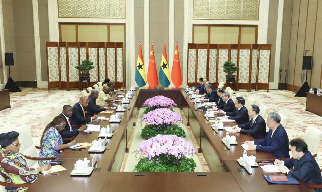 (251013) -- BEIJING, Oct. 13, 2025 (Xinhua) -- Chinese Premier Li Qiang meets with Ghanaian President John Dramani Mahama, who is here for the Global Leaders' Meeting on Women, at the Diaoyutai State Guesthouse in Beijing, capital of China, Oct. 13, 2025. (Xinhua/Huang Jingwen)
