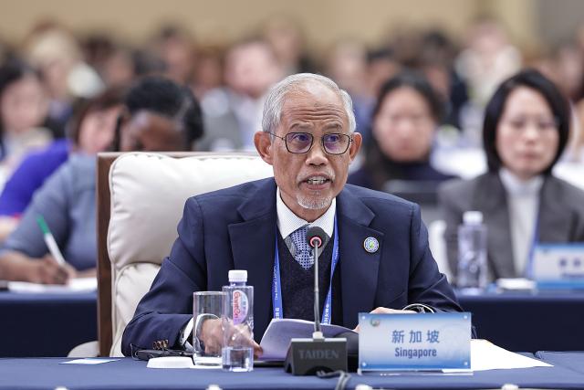 (251013) -- BEIJING, Oct. 13, 2025 (Xinhua) -- A representative from Singapore attends the plenary meeting of the Global Leaders' Meeting on Women in Beijing, capital of China, Oct. 13, 2025. (Xinhua/Zhang Yuwei)