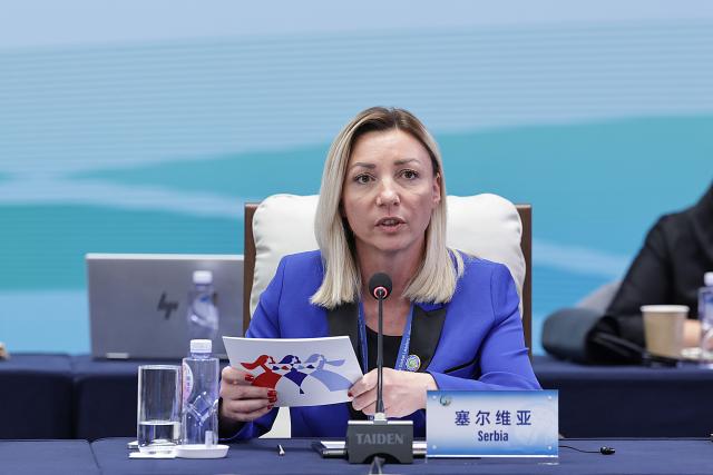 (251013) -- BEIJING, Oct. 13, 2025 (Xinhua) -- A representative from Serbia attends the plenary meeting of the Global Leaders' Meeting on Women in Beijing, capital of China, Oct. 13, 2025. (Xinhua/Zhang Yuwei)