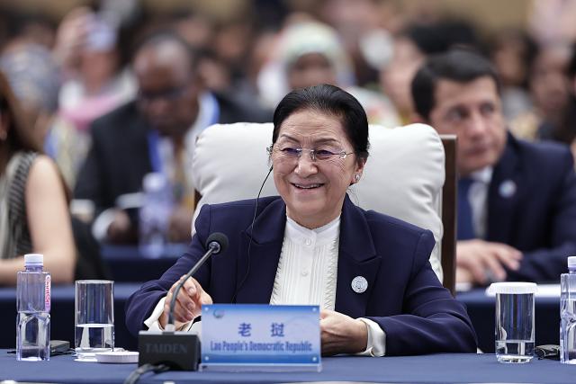 (251013) -- BEIJING, Oct. 13, 2025 (Xinhua) -- A representative from Laos attends the plenary meeting of the Global Leaders' Meeting on Women in Beijing, capital of China, Oct. 13, 2025. (Xinhua/Zhang Yuwei)