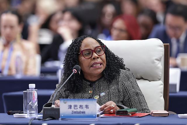 (251013) -- BEIJING, Oct. 13, 2025 (Xinhua) -- A representative from Zimbabwe attends the plenary meeting of the Global Leaders' Meeting on Women in Beijing, capital of China, Oct. 13, 2025. (Xinhua/Zhang Yuwei)