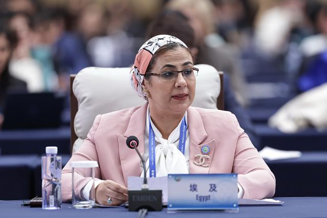 (251013) -- BEIJING, Oct. 13, 2025 (Xinhua) -- A representative from Egypt attends the plenary meeting of the Global Leaders' Meeting on Women in Beijing, capital of China, Oct. 13, 2025. (Xinhua/Zhang Yuwei)