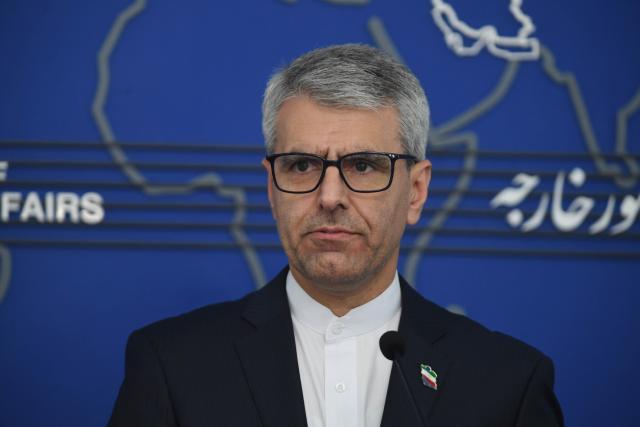 (251013) -- TEHRAN, Oct. 13, 2025 (Xinhua) -- Iranian Foreign Ministry Spokesman Esmaeil Baghaei attends a press conference in Tehran, Iran, on Oct. 13, 2025. Iranian Foreign Ministry spokesman Esmaeil Baghaei said on Monday the recent claim by France, Germany and Britain, collectively known as the E3, about their determination to reinitiate nuclear negotiations with Iran lacks "goodwill and sincerity." (Xinhua/Shadati)