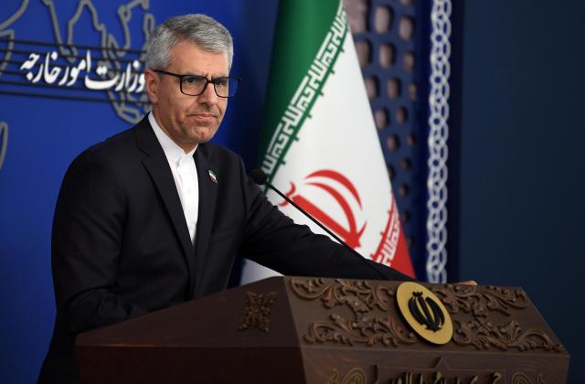 (251013) -- TEHRAN, Oct. 13, 2025 (Xinhua) -- Iranian Foreign Ministry Spokesman Esmaeil Baghaei attends a press conference in Tehran, Iran, on Oct. 13, 2025. Iranian Foreign Ministry spokesman Esmaeil Baghaei said on Monday the recent claim by France, Germany and Britain, collectively known as the E3, about their determination to reinitiate nuclear negotiations with Iran lacks "goodwill and sincerity." (Xinhua/Shadati)