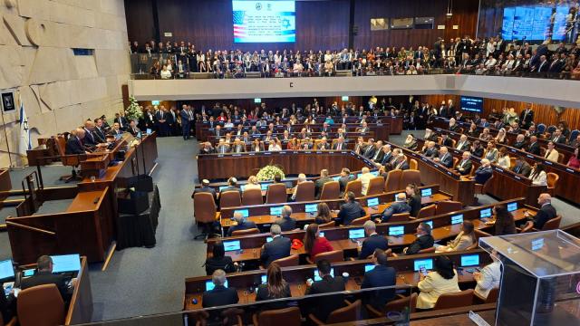 (251013) -- JERUSALEM, Oct. 13, 2025 (Xinhua) -- U.S. President Donald Trump addressed the Israeli parliament, the Knesset, in Jerusalem during a brief visit as the Israel-Hamas ceasefire entered its fourth day, hailing an "end" to Israel's two-year war in Gaza, Oct. 13, 2025. Trump's speech was briefly interrupted when a Knesset member displayed a sign calling for the recognition of Palestine on Monday. (JINI via Xinhua)