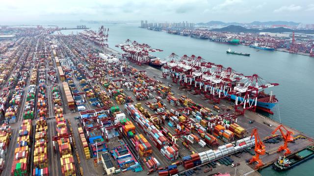(251014) -- BEIJING, Oct. 14, 2025 (Xinhua) -- An aerial drone photo taken on Oct. 13, 2025 shows a view of the container terminal for foreign trade at Qingdao Port in Qingdao, east China's Shandong Province.
  China's total goods imports and exports in yuan-denominated terms rose to 33.61 trillion yuan (about 4.73 trillion U.S. dollars) in the first nine months of 2025, up 4 percent year on year, official data showed Monday. (Photo by Yu Fangping/Xinhua)