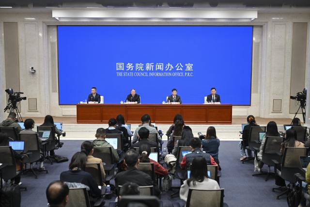 (251014) -- BEIJING, Oct. 14, 2025 (Xinhua) -- Liu Huanxin, a member of the Communist Party of China Leadership Group of the National Development and Reform Commission and head of the National Food and Strategic Reserves Administration (NFSRA), and Qian Yi and Qin Yuyun, both deputy heads of the NFSRA, attend a press conference held by the State Council Information Office (SCIO) on grain circulation reform and development during the 14th Five-Year Plan period (2021-2025) in Beijing, capital of China, Oct. 14, 2025. (Xinhua/Chen Yehua)