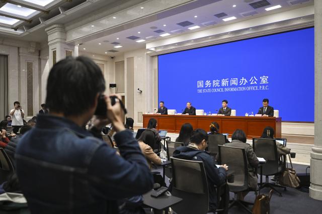 (251014) -- BEIJING, Oct. 14, 2025 (Xinhua) -- Liu Huanxin, a member of the Communist Party of China Leadership Group of the National Development and Reform Commission and head of the National Food and Strategic Reserves Administration (NFSRA), and Qian Yi and Qin Yuyun, both deputy heads of the NFSRA, attend a press conference held by the State Council Information Office (SCIO) on grain circulation reform and development during the 14th Five-Year Plan period (2021-2025) in Beijing, capital of China, Oct. 14, 2025. (Xinhua/Chen Yehua)