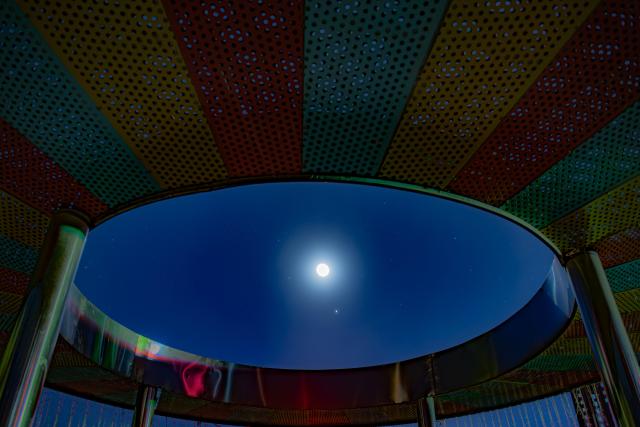 (251014) -- HARBIN, Oct. 14, 2025 (Xinhua) -- This photo taken on Oct. 14, 2025 shows the planet of Jupiter next to the moon in the sky over Beian City, northeast China's Heilongjiang Province. (Photo by Qian Boyu/Xinhua)