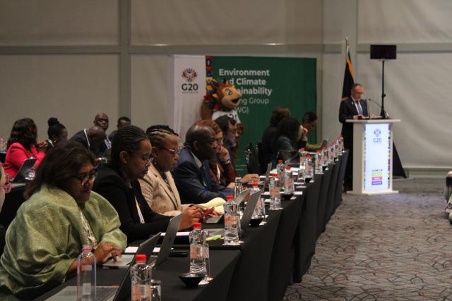 (251014) -- CAPE TOWN, Oct. 14, 2025 (Xinhua) -- Delegates listen as South African Minister of Forestry, Fisheries and the Environment Dion George (at the podium) delivers the opening remarks at the G20 Environment and Climate Sustainability Working Group (ECSWG) meeting in Cape Town, South Africa, Oct. 13, 2025.
  TO GO WITH "G20 environmental talks open in South Africa" (Photo by Shakirah Thebus/Xinhua)