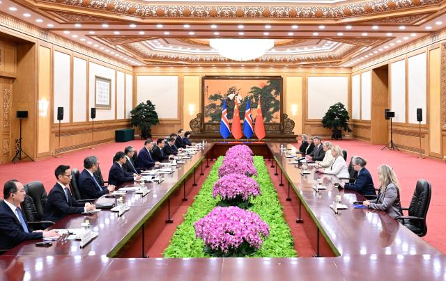 (251014) -- BEIJING, Oct. 14, 2025 (Xinhua) -- Chinese President Xi Jinping meets with President of Iceland Halla Tomasdottir, who is in Beijing for the Global Leaders' Meeting on Women, at the Great Hall of the People in Beijing, capital of China, Oct. 14, 2025. (Xinhua/Shen Hong)