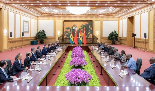 (251014) -- BEIJING, Oct. 14, 2025 (Xinhua) -- Chinese President Xi Jinping meets with Ghanaian President John Dramani Mahama, who is in Beijing for the Global Leaders' Meeting on Women, at the Great Hall of the People in Beijing, capital of China, Oct. 14, 2025. (Xinhua/Zhai Jianlan)
