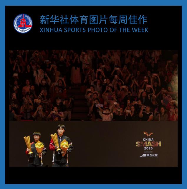 (251014) -- BEIJING, Oct. 14, 2025 (Xinhua) -- XINHUA SPORTS PHOTO OF THE WEEK (from Sept. 22 to Oct. 12, 2025) TRANSMITTED on Oct. 14, 2025. Wang Chuqin (R)/Sun Yingsha pose for photos during the awarding ceremony for the mixed doubles final between Wang Chuqin/Sun Yingsha of China and Huang Youzheng/Chen Yi of China at 2025 World Table Tennis (WTT) China Smash in Beijing, China, Oct. 3, 2025. (Xinhua/Ju Huanzong)