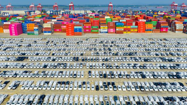 (251014) -- BEIJING, Oct. 14, 2025 (Xinhua) -- An aerial drone photo taken on Oct. 4, 2025 shows cars ready for shipment and export at a port area in Nanjing, east China's Jiangsu Province. China's new energy vehicle (NEV) sector maintained strong momentum in production and sales in the first nine months of the year, according to industry data released Tuesday.
   NEV production jumped 35.2 percent year on year to 11.24 million units during the first three quarters, as reported by China Association of Automobile Manufacturers (CAAM).
   Sales during the same period climbed 34.9 percent year on year to nearly 11.23 million units, accounting for 46.1 percent of total vehicle sales in China, CAAM data showed. (Photo by Yang Suping/Xinhua)