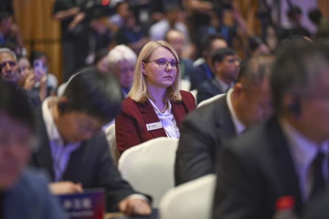(251014) -- SHANGHAI, Oct. 14, 2025 (Xinhua) -- Attendees are pictured during the second edition of World Conference on China Studies in east China's Shanghai, Oct. 14, 2025. The conference got underway here on Tuesday with the theme "Historical and Contemporary China: A Global Perspective."
   Approximately 500 renowned experts and scholars from around the world will engage in in-depth discussions on this theme. The conference features various forums, activities and an exhibition focused on urban civilization. (Xinhua/Chen Haoming)