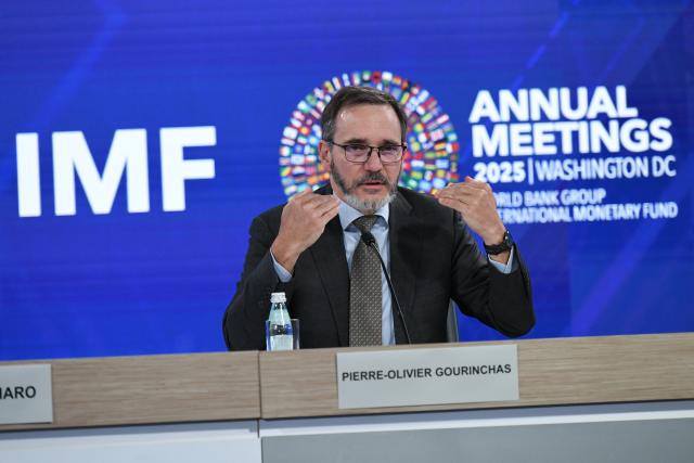 (251014) -- WASHINGTON, Oct. 14, 2025 (Xinhua) -- The International Monetary Fund (IMF) chief economist Pierre-Olivier Gourinchas speaks at a press briefing on World Economic Outlook in Washington, D.C., the United States, Oct. 14, 2025. IMF on Tuesday raised its global economic growth for 2025 to 3.2 percent, 0.2 percentage point higher than the July forecast, the latest World Economic Outlook report said. (Xinhua/Li Rui)