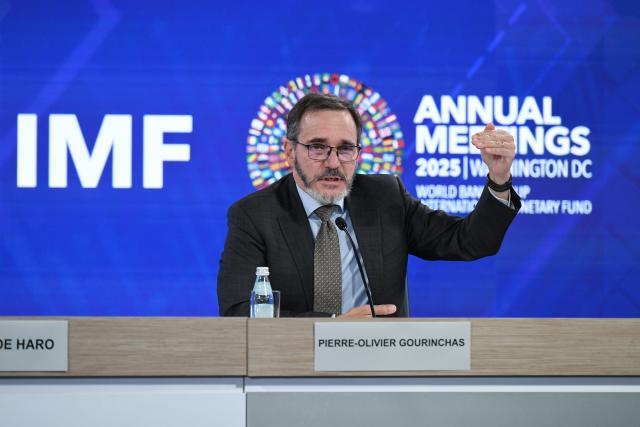 (251014) -- WASHINGTON, Oct. 14, 2025 (Xinhua) -- The International Monetary Fund (IMF) chief economist Pierre-Olivier Gourinchas speaks at a press briefing on World Economic Outlook in Washington, D.C., the United States, Oct. 14, 2025. IMF on Tuesday raised its global economic growth for 2025 to 3.2 percent, 0.2 percentage point higher than the July forecast, the latest World Economic Outlook report said. (Xinhua/Li Rui)