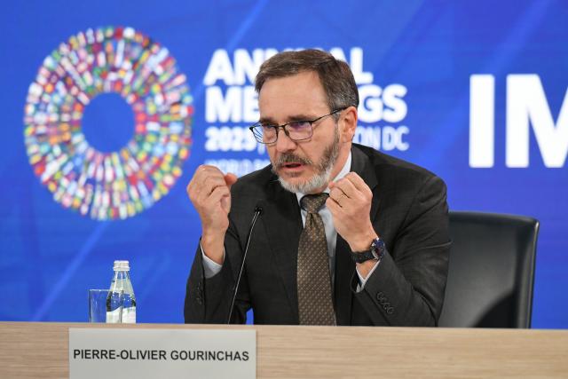 (251014) -- WASHINGTON, Oct. 14, 2025 (Xinhua) -- The International Monetary Fund (IMF) chief economist Pierre-Olivier Gourinchas speaks at a press briefing on World Economic Outlook in Washington, D.C., the United States, Oct. 14, 2025. IMF on Tuesday raised its global economic growth for 2025 to 3.2 percent, 0.2 percentage point higher than the July forecast, the latest World Economic Outlook report said. (Xinhua/Li Rui)