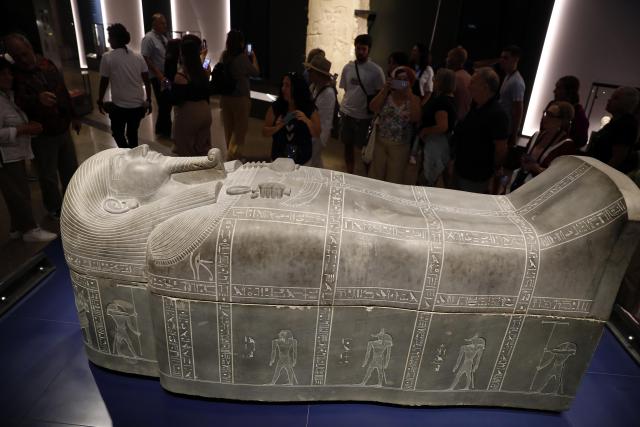 (251014) -- CAIRO, Oct. 14, 2025 (Xinhua) -- Tourists view exhibits at the Grand Egyptian Museum in Giza, Egypt, Oct. 14, 2025. Egypt's Grand Egyptian Museum (GEM) is temporarily closed to the public from Oct. 15 to Nov. 3 in preparation for its official opening, scheduled for early November, according to an announcement published Monday on the museum's official website. (Xinhua/Ahmed Gomaa)