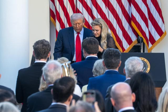 (251014) -- WASHINGTON, Oct. 14, 2025 (Xinhua) -- U.S. President Donald Trump walks with Erika Kirk, wife of Charlie Kirk, after posthumously awarding the Presidential Medal of Freedom to Charlie Kirk in the Rose Garden of the White House, in Washington, D.C., the United States, Oct. 14, 2025. (Xinhua/Hu Yousong)