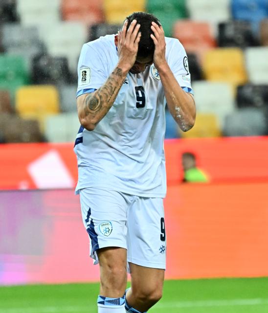 (251015) -- UDINE, Oct. 15, 2025 (Xinhua) -- Tai Baribo of Israel reacts during the FIFA World Cup 2026 European Qualifiers Group I match between Italy and Israel in Udine, Italy, Oct. 14, 2025. (Photo by Diego Petrussi/Xinhua)