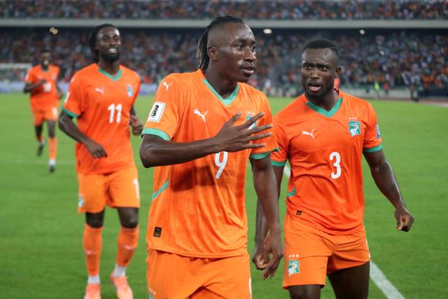 (251015) -- ABIDJAN, Oct. 15, 2025 (Xinhua) -- Yan Diomande (C) of Cote d'Ivoire celebrates his goal during the FIFA World Cup 2026 CAF Qualifiers Group F match between Cote d'Ivoire and Kenya in Abidjan, Cote d'Ivoire, Oct. 14, 2025. (Photo by Yvan Sonh/Xinhua)