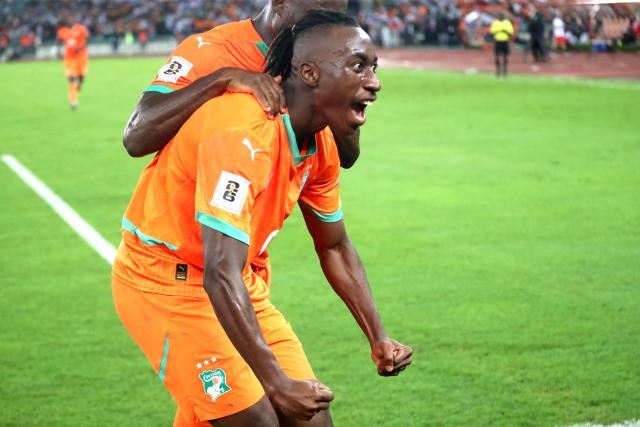 (251015) -- ABIDJAN, Oct. 15, 2025 (Xinhua) -- Yan Diomande of Cote d'Ivoire celebrates his goal during the FIFA World Cup 2026 CAF Qualifiers Group F match between Cote d'Ivoire and Kenya in Abidjan, Cote d'Ivoire, Oct. 14, 2025. (Photo by Yvan Sonh/Xinhua)