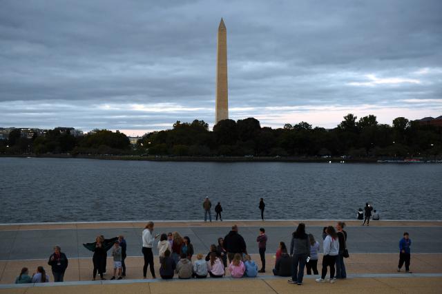 (251015) -- WASHINGTON, Oct. 15, 2025 (Xinhua) -- People gather in front of the Thomas Jefferson Memorial in Washington, D.C., the United States, on Oct. 14, 2025. As the U.S. federal government shutdown stretches into its third week, Treasury Secretary Scott Bessent warned that the closure is already beginning to weigh on the real economy. (Xinhua/Li Rui)