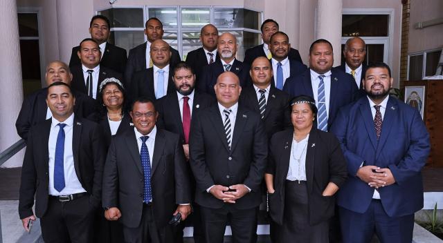 (251015) -- YAREN, Oct. 15, 2025 (Xinhua) -- Nauru President David Adeang (C, front) poses for a group photo with parliament members in the 25th parliament in the Republic of Nauru, Oct. 14, 2025. Incumbent President David Adeang has been re-elected as president of Nauru for a second term following Saturday's national elections. (The Government of the Republic of Nauru/Handout via Xinhua)