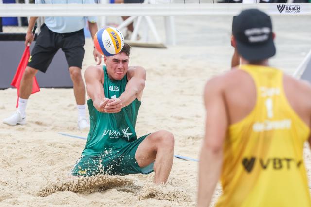 (251015) -- LAGUNA PROVINCE, Oct. 15, 2025 (Xinhua) -- Ben Hood (L) of Australia digs the ball during the men's qualification match between Ben Hood/Oliver Merritt of Australia and Luke de Greef/Martin Licht of Canada at the Volleyball World Beach Pro Tour in Laguna Province, the Philippines, Oct. 15, 2025. (Xinhua/Rouelle Umali)
