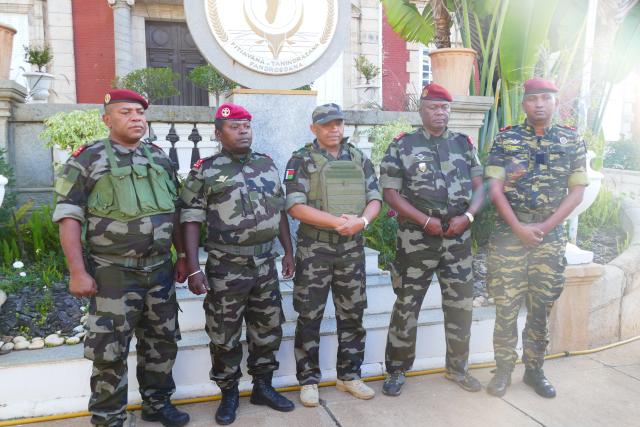 (251015) -- ANTANANARIVO, Oct. 15, 2025 (Xinhua) -- Colonel Michael Randrianirina (C), a Malagasy military officer, is seen at the presidential palace in Antananarivo, Madagascar, Oct. 14, 2025. Colonel Michael Randrianirina, a Malagasy military officer, announced on Tuesday that state power in Madagascar has been taken over by a military council comprising members of the army, gendarmerie and national police.
   On the same day, the National Assembly of Madagascar, the lower house of the country's bicameral parliament, voted to impeach President Andry Rajoelina during an extraordinary session in the capital, Antananarivo, despite the Presidency's earlier announcement that the assembly had been dissolved. (Xinhua)
